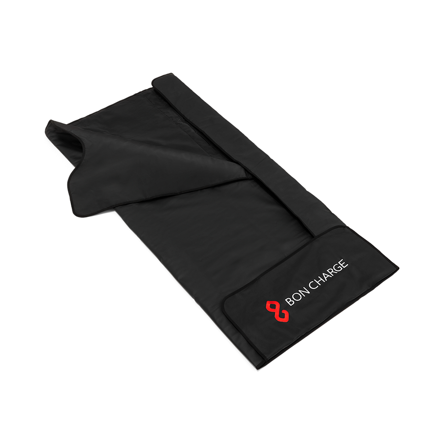 Black BON CHARGE infrared sauna blanket shown open at an angle