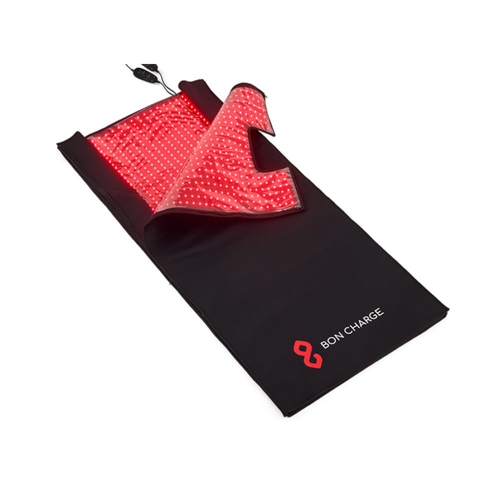 BON CHARGE red light therapy blanket with its illuminated inner surface and controller